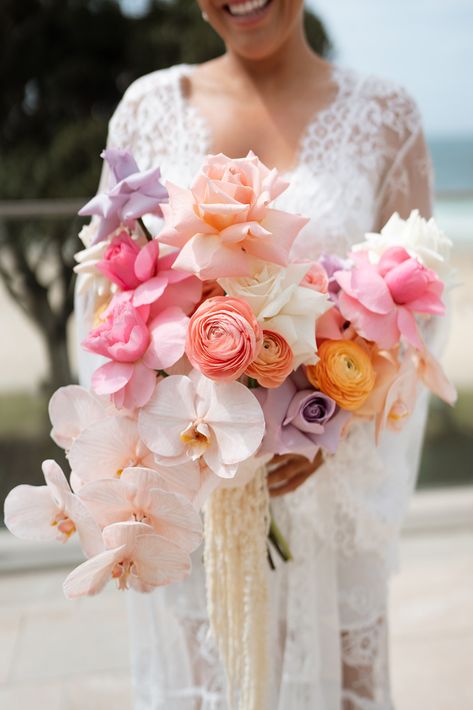 Carla & Joel Noosa Wedding - Mondo Floral Designs Colourful Pastel Wedding Flowers, Mondo Floral Designs, Wedding Bouquets With Orchids, Sunset Florals, Aulani Wedding, Engagement Backdrop, Orchid Bouquet Wedding, Ocean Flowers, Color Durazno