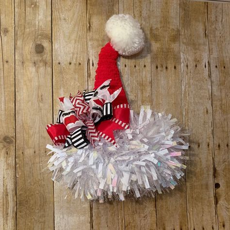 What a cute way to welcome your guests this Christmas Season.   This hat is bright and colorful, the hat is made on a 15 inch frame and is covered in red chunky yarn to give it a warm and cozy feel , the brim of the hat is made with white iridescent tinsel and is decorated with a big bow made with red striped ribbon, Santa boot ribbon, red and white glitter chevron ribbon, and black and white stripe ribbons.   This hat measures approximately 22 inches from the top of the Pom Pom  to the bottom o Christmas Door Ideas For Classroom, Door Ideas For Classroom, Christmas Door Ideas, Christmas Yarn Wreaths, Door Garland, Christmas Door Decor, Ideas For Classroom, Santa Wreath, Candy Cane Wreath