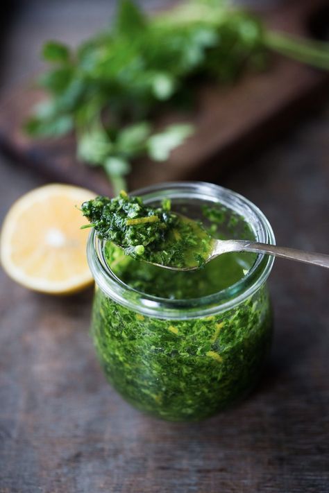 A flavorful recipe for Gremolata, a zesty Italian herb sauce that gives a flavorful boost to fish, chicken, pasta, soups and stews.  Made with very simple ingredients, this version is made into a 'sauce' with an olive-oil base and keeps for 7-10 days in the fridge. Make it in 5 minutes! Many of you are probably already familiar with Gremolata-  but if not, this could be the difference between a dish that is bland and unexciting to something alive and truly bursting with flavor!  And the best thi Gremolata Recipe, Easy Baked Chicken Breast, Homemade Pesto Recipe, Pesto Vegan, Fish Pasta, Risotto Dishes, Italian Parsley, Lectin Free, Herb Sauce