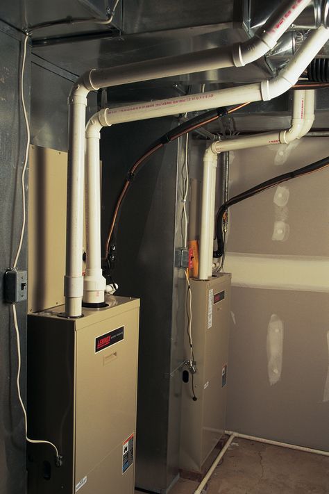 Recommended Breaker Size for an Electric Furnace | Hunker Basement Window Replacement, Furnace Room, Basement Layout, Basement Laundry Room, Basement Laundry, Diy Basement, Basement Windows, Waterproofing Basement, Basement House