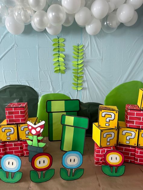 Super Mario Cardboard Diy, Super Mario World Decorations, Super Mario Theme Birthday Party, Super Mario Bros Halloween Decorations, Diy Mario Backdrop, Mario Bros Office Decorations, Mario Theme Decorations, Mario And Luigi Decorations, Mario Tunnel Diy