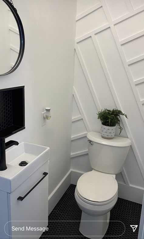 Half Bath Half Laundry Room, Powder Room With Tile Accent Wall, Accent Wall Half Bathroom, Accent Wall In Powder Room, Basement Half Bathroom, Bathroom And Laundry Combo, Black And White Half Bathroom, Modern Half Bathroom Ideas, Modern Half Bathroom