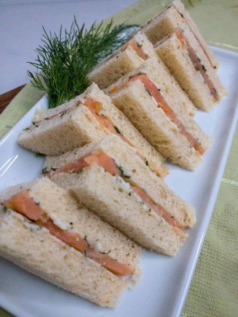 This addicting tea sandwich features a homemade herb butter and delicate smoked salmon. Tea Sandwiches Salmon, Smoked Salmon And Dill Sandwich, Salmon Tea Sandwiches Recipes, Salmon Sandwich Ideas, Smoked Salmon Tea Sandwiches, Salmon Tea Sandwiches, Salmon Sandwich Recipes, Salmon Sandwiches, Smoked Salmon Sandwich