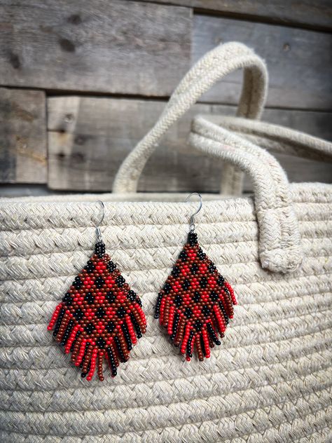 Stay warm and cozy while styling in your trendy buffalo plaid beaded earrings. Beaded Buffalo Pattern, Plaid Seed Bead Earrings, Buffalo Bills Beaded Earrings, Red And White Seed Bead Earrings, Buffalo Plaid Beaded Earrings, Red And Black Seed Bead Earrings, Red Bead Earrings, Diy Seed Bead Earrings, Beautiful Beaded Earring