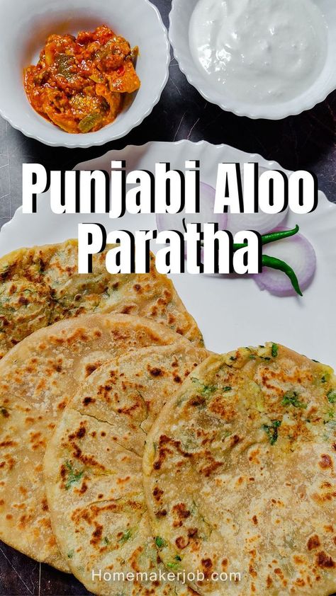 4 punjabi aloo paratha breads served in a white dish garnished with sliced onions and two green chilies accompanied by mango pickle and curd in two separate bowls Aloo Paratha Recipe, Stuffed Paratha, Indian Bread Recipes, Aloo Paratha, Stuffed Bread, Paratha Recipe, Paratha Recipes, Indian Bread, Vegetarian Chili