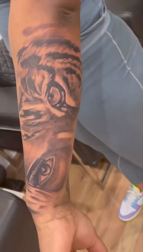 Lion Tattoo For Black Women Arm, Tiger Tattoo Black Women, Woman Eye Tattoo, Lion Eyes Tattoo Forearm Women, Lions Eyes Tattoo, Lion Eye Tattoo For Women, Lion Eyes Tattoo, Half Eye Half Tiger Tattoo, Tiger Eyes Tattoo For Women Sleeve