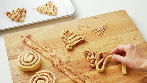 Christmas Tree Cinnamon Rolls Recipe - Pillsbury.com Christmas Tree Cinnamon Rolls, Cinnamon Rolls Christmas, Roll Christmas Tree, Pillsbury Cinnamon Rolls, Cinnamon Roll Bake, Kids In The Kitchen, Pillsbury Recipes, Holiday Sprinkles, Fun Recipes