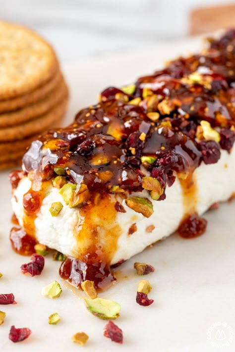 Cranberry Pistachio Fig Cheese Log is a festive appetizer that is easy to make. The sweet-savory flavor combo makes it perfect for holiday parties! #christmasappetizer #cheeselog Fig Cheese, Cheese Log Recipes, Cranberry Appetizer, Cheese Ball Recipes Easy, Cream Cheese Appetizer, Cheese Log, Cranberry Pistachio, Goat Cheese Recipes, Fig Recipes