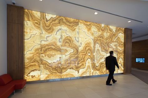 Backlit Translucent Honey Onyx Feature Wall | GPI Design Onyx Wall, Artificial Marble, Dark Panels, Quartz Slab, Stone Panels, Lobby Interior, Onyx Marble, Garage Interior, Decorative Wall Panels