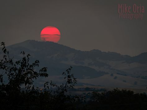 https://flic.kr/p/NWpib7 | Red Sun & Diablo | Red Sun drops behind Mt. Diablo  Massive and sustained wildfires to the north and south were responsible for the series of red sunsets in the area. In addition to the scatter effect on the appearance of the sun, they caused the skies to look much darker than usual. Red Sun Painting, Red Sun Aesthetic, Scorched Earth, Dark Mountains, Sun Aesthetic, Sun Painting, Sun Photo, Sunset Background, Open Art