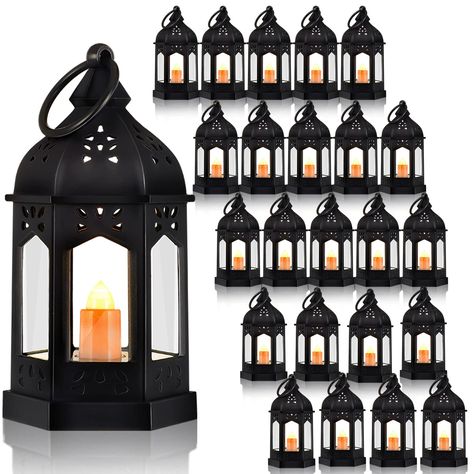 PRICES MAY VARY. What You Will Get: the package includes 24 Halloween mini lantern with 6 transparent glass plates; The interior is in the shape of candles, which fully meets your decorative needs and is bright enough to illuminate your table in the dark Flicker Effect: lanterns flicker likes real candles, providing warm white light, making the vintage decorative lantern more attractive and charming, creating a warm and romantic atmosphere and bringing you a good mood Small and Exquisite: decora Lanterns Hanging, Dark Wedding Theme, Hanging Candle Lanterns, Lantern Wedding, Taylor Wedding, Lantern Centerpiece Wedding, Halloween Themed Wedding, Mini Lanterns, Lantern Centerpieces