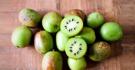 Everything You Need to Know About the Kiwi Berry | Better Homes & Gardens Moon Drop Grapes, Mantu Recipe, Kiwi Berry, Hardy Kiwi, Kiwi Recipes, Wassail Recipe, Cotton Candy Grapes, Kiwi Berries, Scallop Recipes