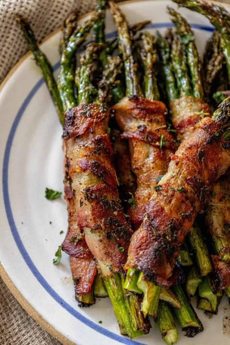 Garlic Bacon Wrapped Asparagus - side dishes #sidedishes Maple Bacon Wrapped Asparagus, Crock Pot Asparagus Recipes, Bacon Wrapped Asparagus On The Grill, Bacon Asparagus Recipes, Bacon Wrapped Asparagus In Oven, Sauteed Asparagus Recipes, Asparagus Bacon Wrapped, Asparagus Wrapped In Bacon, Grilled Bacon Wrapped Asparagus