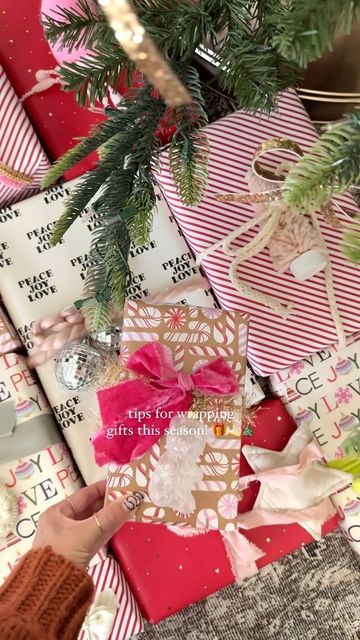 Deborah Trette on Instagram: "#AD: it’s the season for gift wrapping and I have a few tips for making them look beautiful! Be sure to stock up on @scotch tape, the number one essential this holiday season! I always grab the magic and original versions as they are both invisible. Skip the gift bags and opt for mix and matched gift paper! Use a variety of ribbons, textures and chunky yarns — also, ornaments make great gift toppers! The Best Gift Wrapping Starts with ScotchTM Brand Tape! Follow my shop @myfourwonders on the @shop.LTK app to shop this post and get my exclusive app-only content! #liketkit #LTKhome #LTKHoliday #LTKSeasonal @shop.ltk https://liketk.it/4pn6B #Target #TargetPartner #ScotchBrandHoliday #ScotchBrand #ScotchTape #christmas #christmasdecor #christmasinspiration #gif Best Gift Wrapping, Holiday Wrapping Paper Target, Extra Wrapping Paper Bow, Pink Xmas Initial Tag, Vintage Pink Christmas Wrapping Paper, Brown Wrapping Paper Pink Ribbon, Gift Paper, Scotch Tape, Jolly Holiday