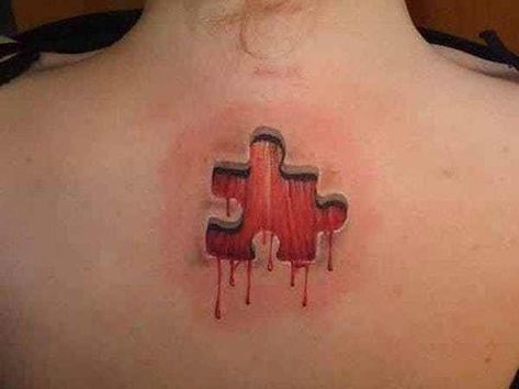 25 Disturbing Tattoos That Will Make You Super Uncomfortable Jigsaw Tattoo, Best 3d Tattoos, Puzzle Piece Tattoo, Amazing 3d Tattoos, Puzzle Tattoos, Horror Movie Tattoos, Hyper Realistic Tattoo, Movie Tattoos, Scary Tattoos