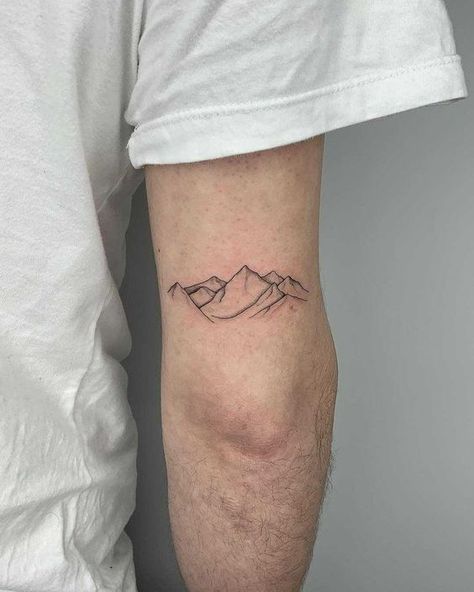 Minimalistic Hand Tattoos: Celebrating Style and Symbolism for Men 2023 - mens-club.online Moutain Tattoos, Tricep Tattoos, Mountain Tattoo Simple, Simple Tattoos For Guys, Petit Tattoo, Men Tattoos Arm Sleeve, Omerta Tattoo, Wrist Tattoos For Women, Minimalist Tattoos