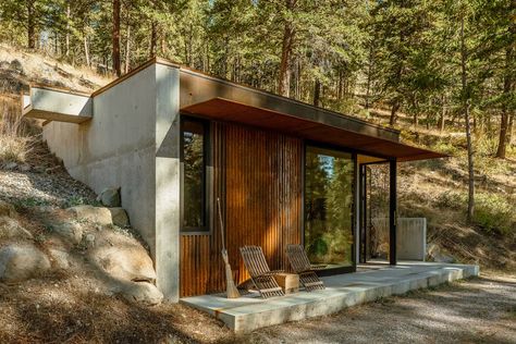 Photo 2 of 13 in She Built a 330-Square-Foot Cabin in One of Washington’s Biggest Outdoors Destinations - Dwell Hillside Adu, Exterior Metal Siding, House Built Into Hillside, Cabin Building, Eco Houses, Hilltop House, Concrete Siding, Small House Architecture, Eco Cabin