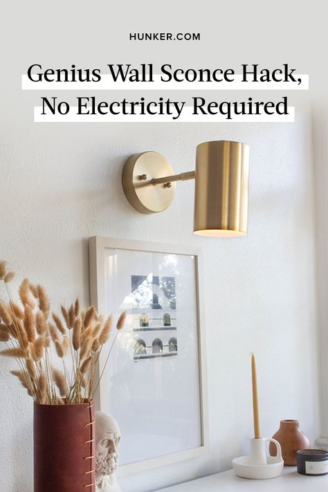 That's right, no wires, no plugs, and no holes in the wall. The secret? Puck lights. Scroll on to find out just how simple this lighting trick is. #hunkerhome #wallsconce #lighting #lightingideas #sconcelighting Lighting Hacks, Sconces Living Room, Plug In Wall Lights, Wall Scones, Decorative Wall Sconces, Puck Lights, Basket Lighting, Wall Lights Bedroom, Wall Sconces Bedroom