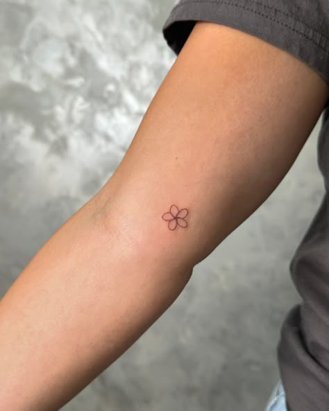 Dainty Small Tattoos For Women, Tiny Plumeria Tattoo, Frangipani Tattoo Fine Line, Minimalist Tattoo Hip, Frangipani Flower Tattoo, Micro Flower Tattoo, Petite Tattoos For Women, Minimal Tattoo Arm, Small Flower Tattoo Placement