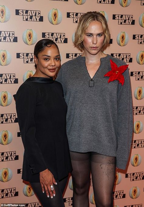 She posed for pictures at the performance with American actress Tommy Dorfman... Posed For Pictures, Tommy Dorfman, Tessa Thompson, Black Characters, Interracial Couples, George Clooney, Black Leather Ankle Boots, The Press, Poses For Pictures