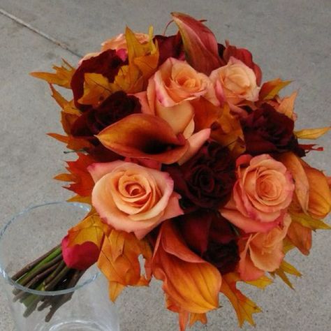 Fall wedding bouquet Fall Wedding Bouquets With Leaves, Amber Wedding Bouquet, Burgundy And Orange Bouquet, Unique Bouquet Ideas, Fall Wedding Flowers October, Fall Bridesmaid Bouquet, Burnt Orange Dahlia Bouquet, Plum And Orange Wedding Bouquet, Orange And Purple Fall Wedding Bouquet