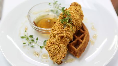 Celebrate #NationalWaffleDay with this healthier recipe: Crispy Chicken Whole Wheat Waffles and Vanilla Agave Syrup. #healthyrecipes #waffles #everydayhealth.com Worst Cooks In America, Whole Wheat Waffles, Worst Cooks, Buttermilk Fried Chicken, Fried Chicken Recipes, Chicken And Waffles, Crispy Chicken, Eggs Benedict, Kimchi