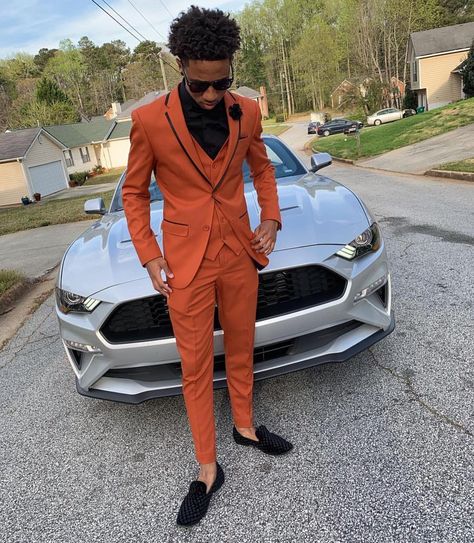 Image may contain: one or more people, people standing, car and outdoor Orange Prom Suit, Prom Outfits For Guys, Lapel Wedding, Prom For Guys, Prom Blazers, Stylish Men Wear, Prom Suits For Men, Prom Suit, Orange Suit