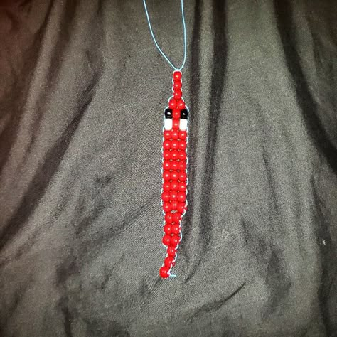 Beaded Dudes, How To Make Kandi Worm, Kandi Worm, Kandi Worm On A String Tutorial, Worm On A String Crafts, Diy Worm On A String, Worms On Strings, Crochet Worm On A String, How To Make Worm On A String