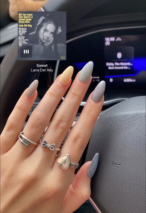 grey and yellow acrylic nails that match lana del rey’s newest album’s color palette Lana Del Rey Acrylic Nails, Almond Nails Lana Del Rey, Lana Del Rey Nails Design, Lana Del Rey Nails National Anthem, Lana Del Rey Ring, Nail Inspo Lana Del Rey, Twilight Aesthetic Nails, Lana Del Ray Inspired Nails, Lana Del Rey Blue Nails