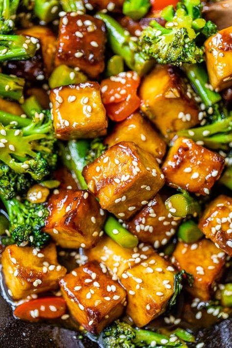 This quick and easy Sesame Soy Tofu Stir Fry is loaded with fresh and colorful vegetables and plant-based protein. #tofu #tofustirfry #plantbased #healthyrecipes #stirfry Firm Tofu Recipes, Stir Fry With Vegetables, Soy Tofu, Tofu Stir Fry, Tofu Dishes, Sesame Sauce, Veggie Meals, Veggie Delight, Colorful Vegetables