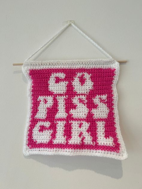 ✨Make your own Go Piss Girl crochet tapestry!✨ 📏 This tapestry is approximately 22cm x 20cm in size, measured from the bottom of the dowel rod 📏 ✍🏼This pattern includes instructions that have been written out in 3 different ways 1. Stitch Fiddle Graph  2. Colour Block Instructions  3. Written Instructions  🧶Materials needed:🧶 - 4mm crochet hook (can use other sizes at your own discretion) - Pink DK wool  - White DK wool - Dowel rod - Scissors - Darning needle  🌱Stitches used in pattern:🌱 Half Double Crochet Tapestry, Aesthetic Crochet Tapestry, Small Crochet Tapestry, Easy Crochet Tapestry, Two Colour Crochet, Crochet Tapestry Grid, Crocheted Tapestry, Crochet Tapestry Pattern Free Charts, Tapestry Crochet Patterns Charts