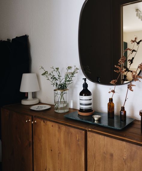 This IKEA IVAR hack makes a first impression in an entryway | Livingetc Stockholm Mirror Ikea, Dark Entryway, What Size Mirror, Ikea Ivar Hack, Mirrors Urban Outfitters, Ikea Ivar Cabinet, Ikea Stockholm, Narrow Entryway, Ikea Ivar