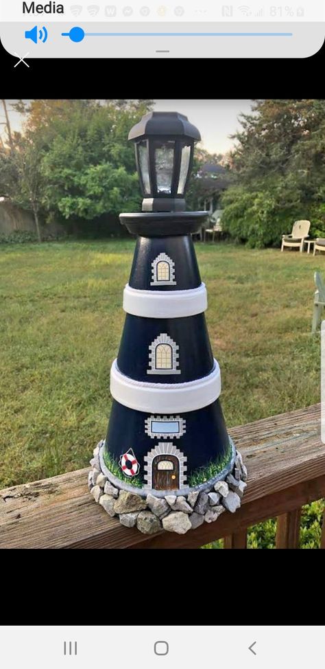 Clay Lighthouse, Front Door Painting, Lighthouse Diy, Front Porch House, Decorating Front Door, Door Painting Ideas, Diy Lighthouse, Clay Pot Lighthouse, Lighthouse Crafts