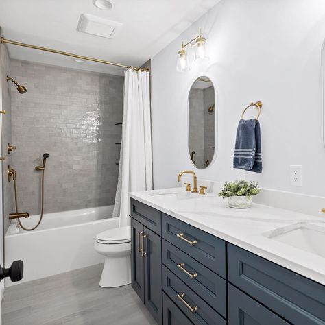 Navy, white, and gold 💙 what are your thoughts on a classic color palette like this in a bathroom? The vanity color is called Navy Masterpiece by @benjaminmoore 🏠 “Denim Blue House Tour” #bathroominspo #coastalbathroom #bluebathroom #bathroomstyle #goldbathroom Bathroom Floor Tile With Blue Vanity, Navy And Silver Bathroom, Farmhouse Navy Bathroom, Dark Blue And Gold Bathroom, Blue Gray Bathroom Vanity, Dark Blue And White Bathroom, Gold And Navy Bathroom, Bathroom Inspiration Blue, Bathroom With Navy Vanity