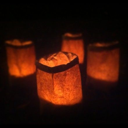 Paper Bag Luminaries · Candle Making | CraftGossip.com Paper Bag Candles, Luminaries Paper Bag, Paper Bag Luminaries, Paper Bag Lanterns, Paradise Decor, Luminary Diy, Homecoming Decorations, Diy Paper Bag, Fake Candles