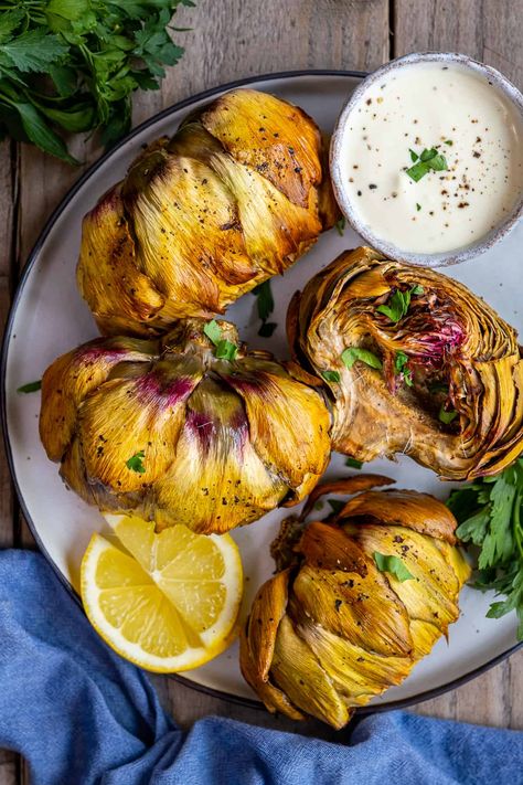 Discover a faster and flavorful way to enjoy artichokes with this Air Fryer Artichokes recipe. In no time, you'll have crispy, tender artichoke halves perfect for dipping in your favorite sauce. Artichoke Dipping Sauce, Dipping Sauce For Artichokes, Artichoke Heart Recipes, Garlic Aioli Sauce, Stuffed Artichokes, Grill Cheese, How To Cook Artichoke, Fried Artichoke, Roast Fish