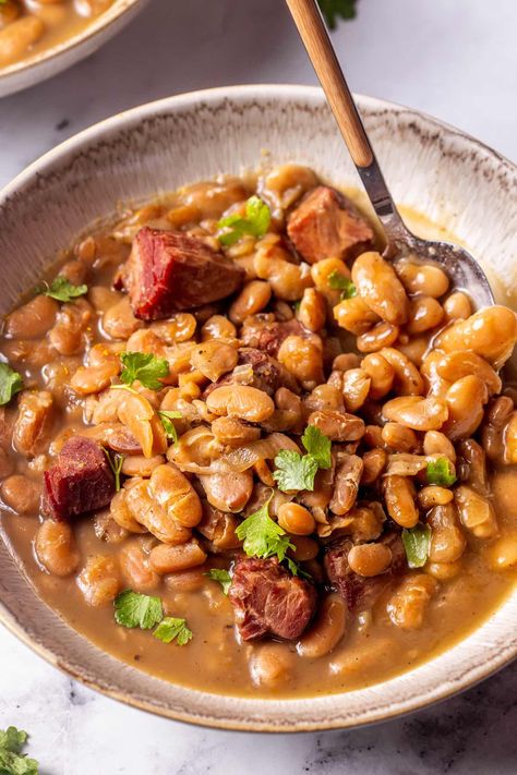 bowl of great northern beans with diced ham and fresh herbs. Great Northern Beans And Sausage, Canned Northern Bean Recipes, Dried Great Northern Beans Recipe, Great Northern Beans Recipe Stove Top, Northern Beans And Ham, Northern Beans Recipe, Great Northern Beans Recipe, Canned Beans Recipe, Beans And Sausage