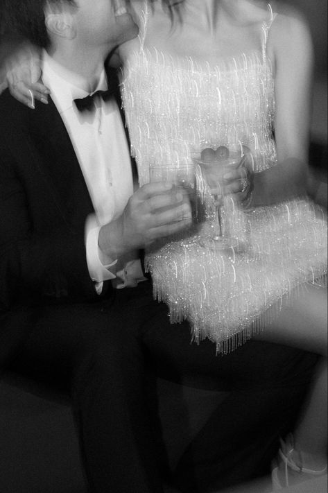 Wedding after party, sparkly mini dress, tuxedo, black and white wedding photgraphy, champagne, blurry wedding photo Wedding Tuxedo Aesthetic, Black And White Flash Wedding Photos, Private Last Dance Wedding Photo, Wedding After Party Club, New Year’s Eve Engagement Photos, Wedding Blurry Photos, Late Night Wedding Photos, Wedding Reception Party Photos, Wedding After Party Photos