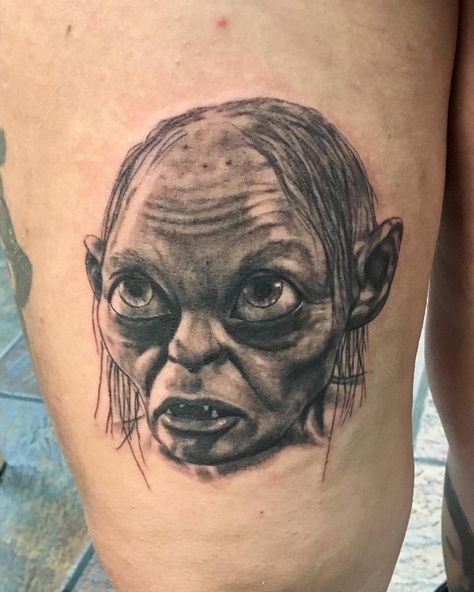 @comfychrisf on Instagram - realistic Sméagol ~ Gollum tattoo, black and gray, done at truth & triumph #realism #tattoos #realistic #ink #inked #realismtattoo #tattooartist #tattooart #realistictattoo #tattooed #blackandgrey #blackandgreytattoo #hyperrealism #photorealism #tattooist #inkedmag #tattoorealistic #pencildrawing #graphite #realismo #portraittattoo #worldfamousink #tattoolife #inkedup #charcoal #wip #pencilart #daytontattoo #truthandtriumph Gollum Tattoo, Lord Of The Rings Tattoo, Ring Tattoos, Realism Tattoo, Hyperrealism, Cover Up Tattoos, Photorealism, Life Tattoos, Black And Grey Tattoos