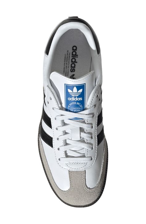 From the soccer field to the streets, this kid-size sneaker maintains its legacy with premium materials and iconic 3-Stripes at the sides. Lace-up style Removable insole Leather upper/synthetic lining/rubber sole Imported Dresses With Sambas, Gym Shoes Outfit, Sambas White, Cute Fits For School, Samba White, Energy Aesthetic, New Adidas Shoes, Feminine Energy Aesthetic, Hoodie Ideas