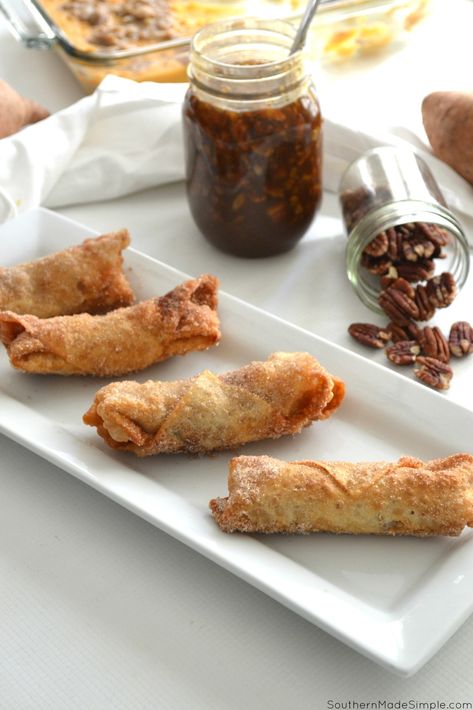 Sweet Potato Casserole Stuffed Eggrolls with Caramel Bourbon Pecan Praline Sauce Pecan Praline Sauce, Caramel Bourbon, Praline Sauce, Leftover Casserole, Pecan Praline, Classic Thanksgiving, Egg Roll Recipes, Pecan Pralines, Sweet Potato Pie