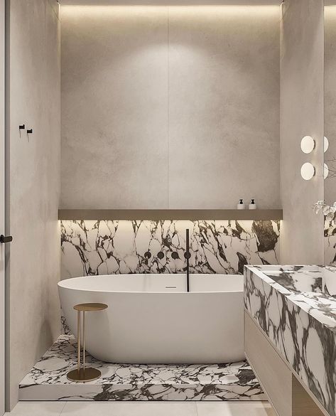 Cream-colored walls and tiles offer a warm, inviting atmosphere, while the black marble elements add depth and sophistication. Subtle lighting enhances the natural beauty of the marble, making the entire bathroom glow with a refined, timeless charm.

@ardi_architects 

Add @designeers.club to your favourites. Click the 3 dots above the photo. 🤍

#interiordesigninspiration #interiorinspiration #designinspiration #architecturaldigest #livingroomdesign #livingroomdecor #furnitureideas #furnitureinspiration #vogueliving #archdigest #axelvervoordt #vincentvanduyson #pierrejeanneret #worldofinteriors #cassini #vitra #homestyling #jeanprouve #isamunoguchi #pierrepaulin #charlotteperiand #homedecor #designtrends #lightingdesign #lightingideas Bathroom Lighting Ideas, Colored Walls, Arch Digest, Cream Marble, Marble Interior, Right Light, Isamu Noguchi, Vogue Living, World Of Interiors