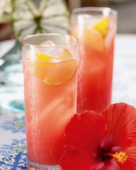 This island-inspired punch is the perfect refresher for a leisurely evening or day of sunbathing by the pool. We shared our Hibiscus Tea Punch recipe on our website. #southernladymag #hibiscustea #punchrecipe #outdoorliving #springrecipe #drinkrecipe #summerdrink #springdrink #springinthesouth #southernparties Tea Punch Recipe, Tea Punch, Spring Drink, Spring Recipe, Tea Health Benefits, Punch Recipe, White Hibiscus, Tea Cocktails, Southern Lady