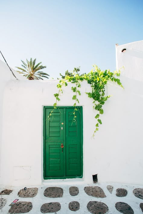 Green Door In Mykonos | Stocksy United #travellingthroughtheworld #travelling #traveller #travel #traveltips #travelphotography #travelblogger #traveldestinations #mykonos #greece #greecetravel Green Door, Mykonos Greece, Beautiful Doors, The Doors, Mykonos, Wall Collage, Beautiful World, Windows And Doors, Outdoor Spaces