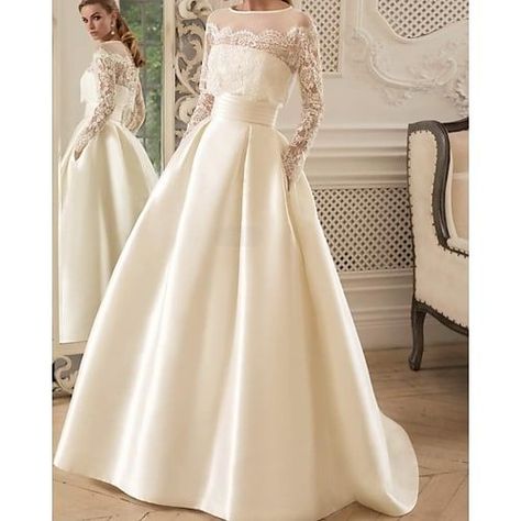 Silhouette:A-Line; Hemline / Train:Floor Length; Closure:Zipper UP; Fully Lined:Yes; Built-In Bra:Yes; Wedding Events:Engagement,Church; Embellishment:Pleats,Beading,Appliques; Fabric:Satin,Lace; Sleeve Length:Long Sleeve; Tips:Colors may vary slightly due to different monitor settings; Theme:Luxurious,Formal; Boning:Yes; Style:1940s / 1950s,Formal,Vintage; Waistline:Natural; Neckline:Illusion Neck; Brand:LAN TING Express; Front page:Wedding Dresses; Listing Date:12/09/2020; Bust:; Hips:; Hollow Boazer Wedding Dress, Luxury Modest Wedding Dress, Wedding Dress Coat Long, Modest Ballgown Dress, Davids Bridal Wedding Dresses Sleeves, Elegant Wedding Dress With Pockets, Elegant Long Sleeve Wedding Dresses Couture Candy, Wedding Dresses Long Sleeve Turtle Neck, Vintage Wedding Dress With Sleeves Victorian Tea Length