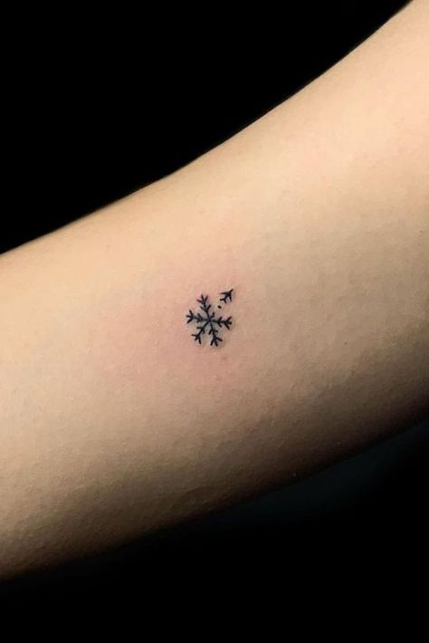 25 Snowflake Tattoo Ideas: Channeling the Beauty of Winter's Delicacy Summer Winter Tattoo, Minimalist Snowflake Tattoo, Winter Tattoos For Women, Snow Flakes Tattoo, Small Christmas Tattoos, Snow Tattoo Ideas, Enjoy The Journey Tattoo, Snowflake Tattoo Design, Winter Tattoo Ideas