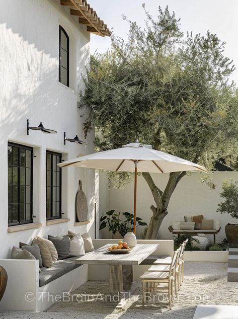 Our small modern Mediterranean backyard projects range from Spanish-style to Italian, Greek, and even Ibiza-style patio ideas and designs! Greek Outdoor Design, Patio Courtyard Ideas Outdoor, Modern Mediterranean Front Porch, Spanish Guest House, Mediterranean Patio Design Ideas, Greek Inspired Home Interior Design, Greek Style Decor, Greek Modern House, European Outdoor Patio