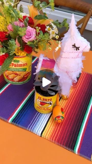 Christie Troxell on Instagram: "This bright and cheery Fiesta styled engagement party is a great place to “Taco Bout Love”, and margaritas! Party the summer away with this versatile theme that works for so many occasions! Check the cute succulents in cans of enchilada sauce and chilies, some of the labels are custom graphics with the names of the bride and groom on them, adorable mini llama piñatas top off the look. #tacoboutlove #tacotaco #tacosandtequila #engagementparty" Taco Bout Love Rehearsal Dinner, Taco About Love Engagement Party, Taco Themed Engagement Party, Fiesta Themed Engagement Party, Taco Engagement Party, Taco Bout Love Bridal Shower Ideas, Fiesta Engagement Party, Taco Bout A Party, Taco Bout Love