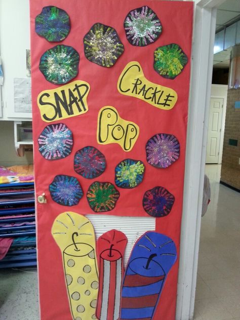 July 4th door with handprint fireworks 4th Of July Classroom Door, July Bulliten Board Ideas, New Year Daycare Door, 4th Of July Door Decorations Classroom, July Classroom Door Ideas, Fourth Of July Classroom Door Ideas, Fireworks Bulletin Board Ideas, July Door Decorations Classroom, July Daycare Door Theme