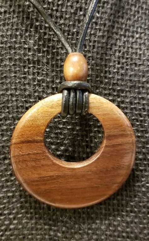 2 1/4" diameter black walnut pendant on adjustable black leather necklace. By the Woodchuck of Woodburn. Necklace Sliding Knot, Wooden Jewelery, Wood Jewelery, Driftwood Jewelry, Wood Resin Jewelry, Black Leather Necklace, Diy Collier, Jewelry Knots, Wooden Necklace